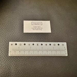 Authentic Louis Vuitton ruler for 6 ring organizer. Unused .